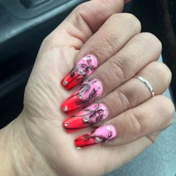 Pink and red nail set with hand-painted floral details